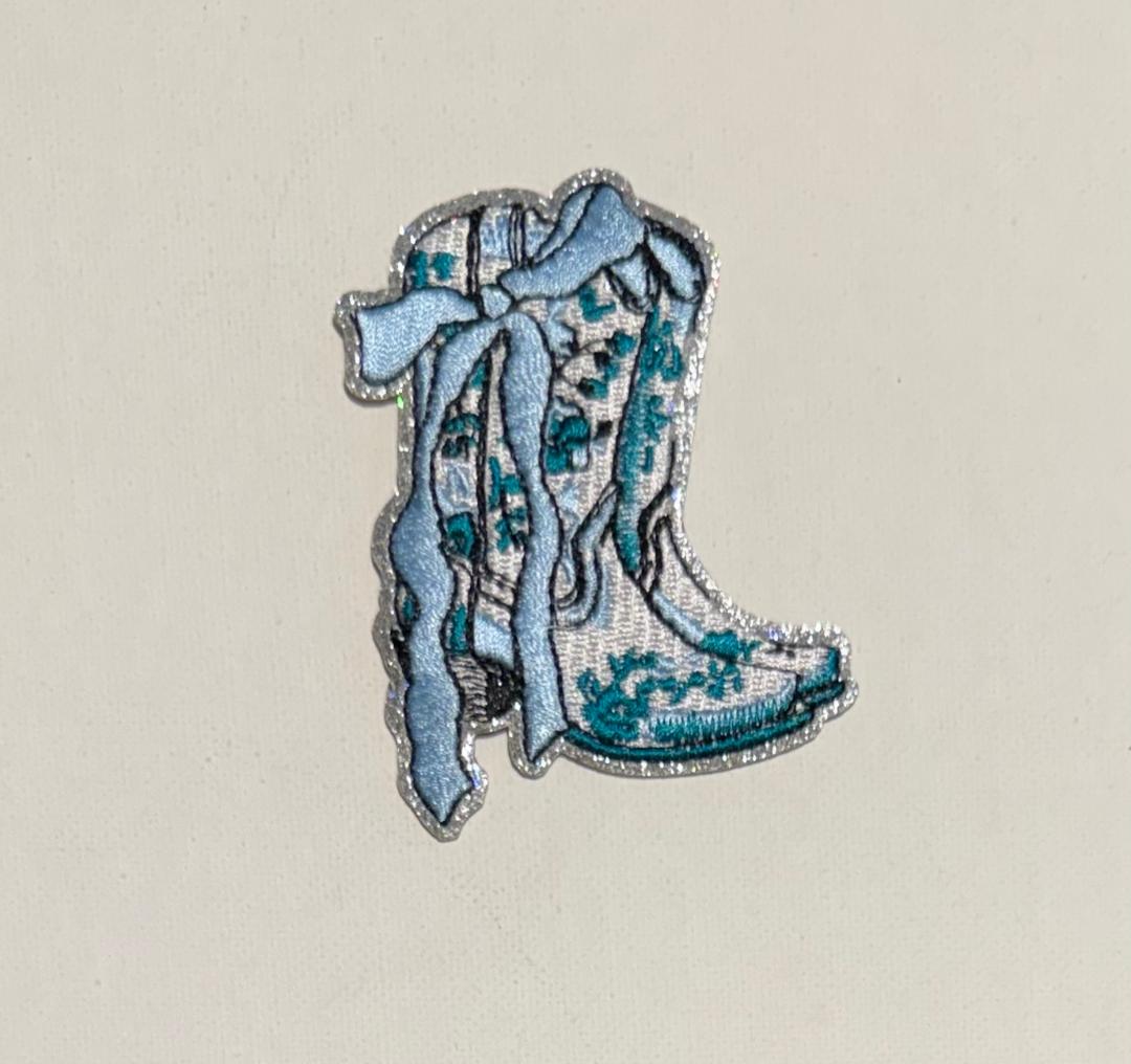 Light blue/teal boots hat patch
