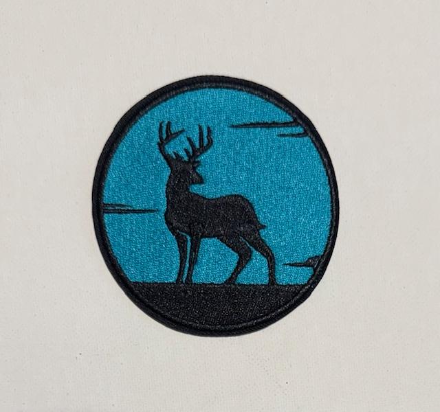Teal round deer hat patch