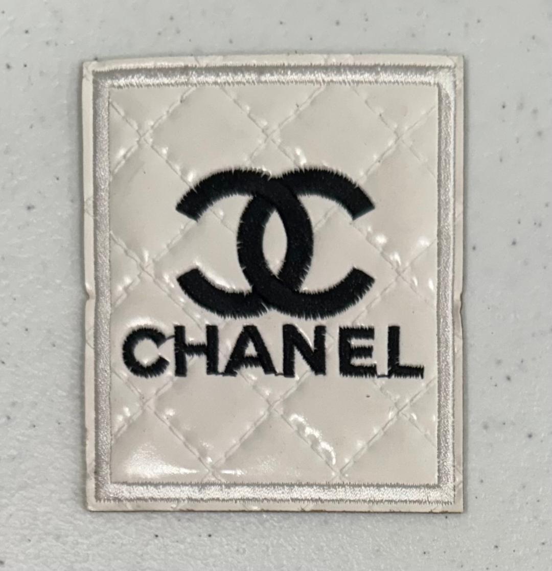 White Chanel hat patch
