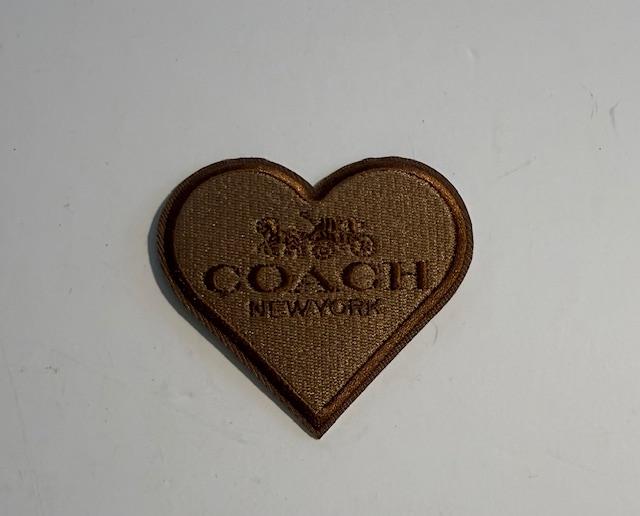 Coach tan heart hat patch