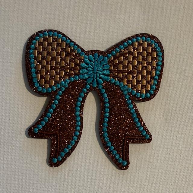 Brown bow,outlined teal hat patch