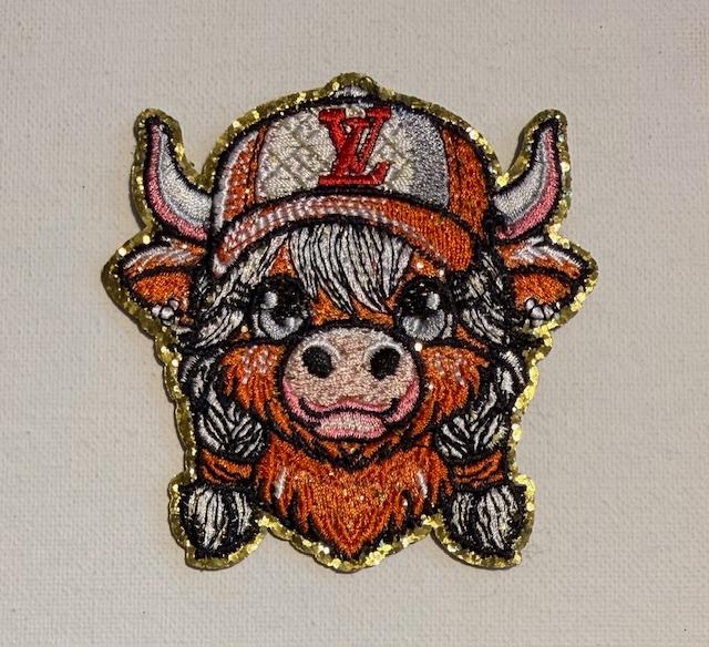 Girl cow w. orange LV -hat patch