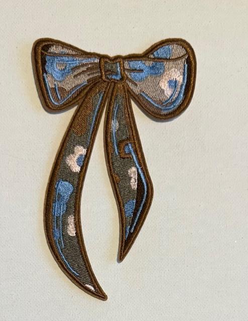 Bow, brown tan, blue hat patch