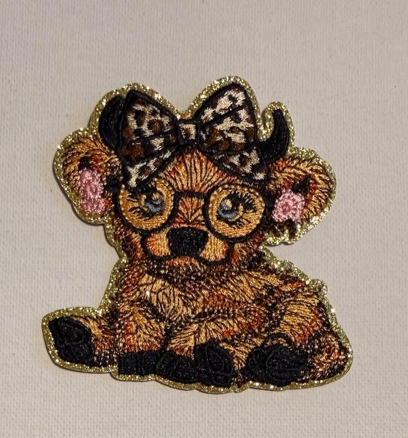 brown cow w/ cheetah bow-hat patch