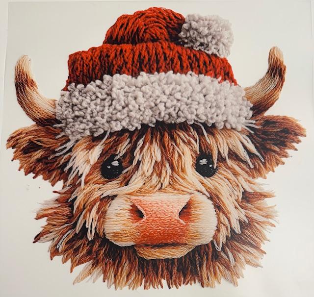 Christmas Cow in Santa hat