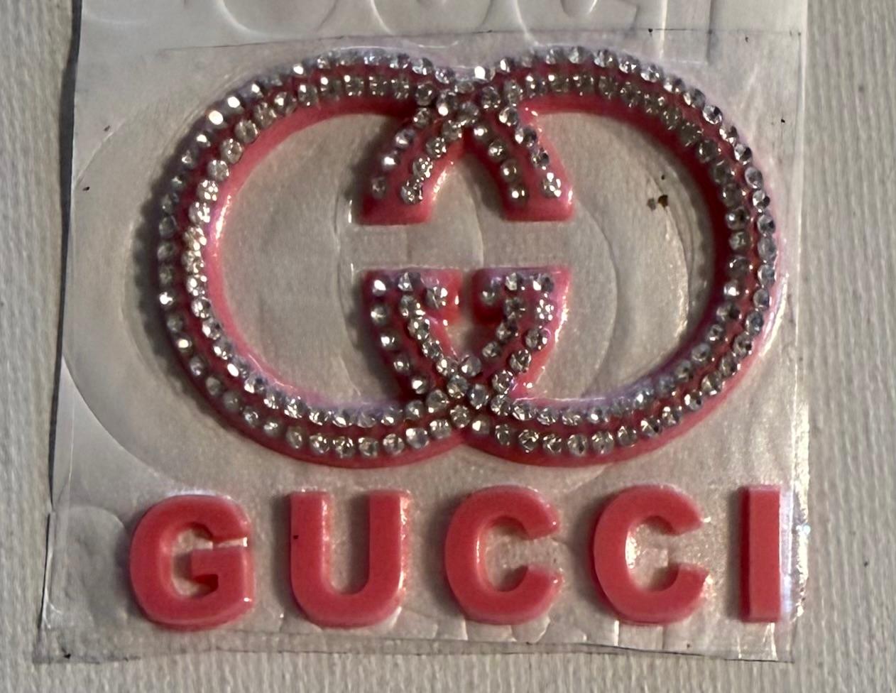Pink Gucci stud hat patch