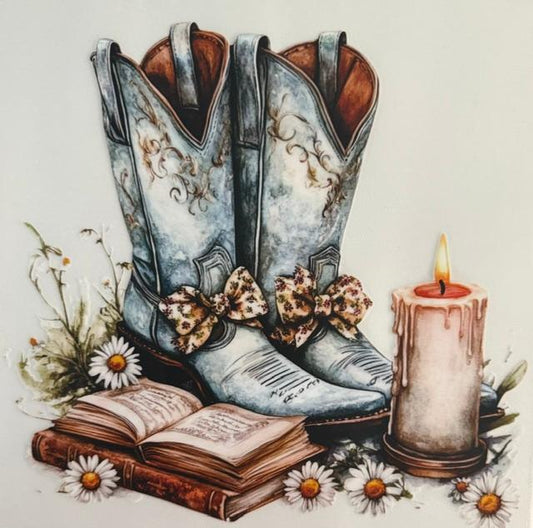 Boots with bows, Bible and a Candle