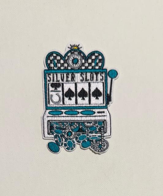 Silver Slots teal hat patch