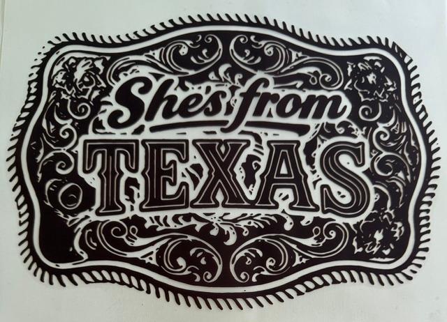 She's from Texas - belt buckle