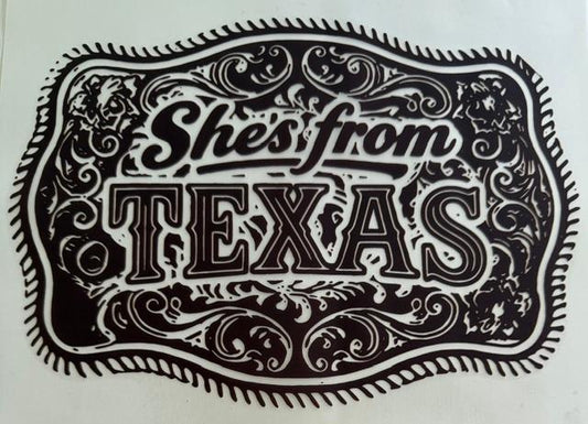 She's from Texas - belt buckle