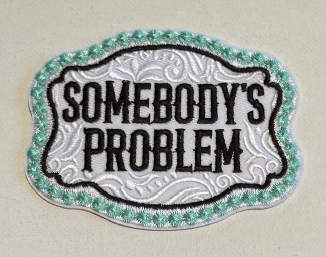 Somebody's Problem teal hat patch