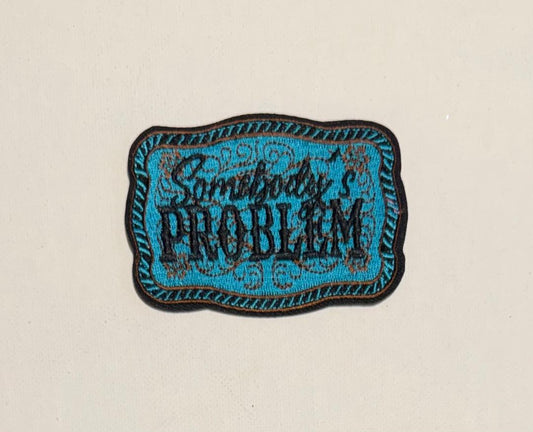 Teal Buckle, Somebody's Problem hat patch