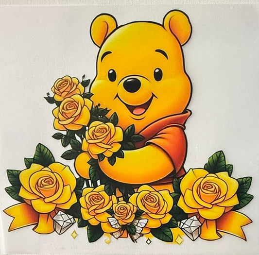 Pooh - holding yellow roses