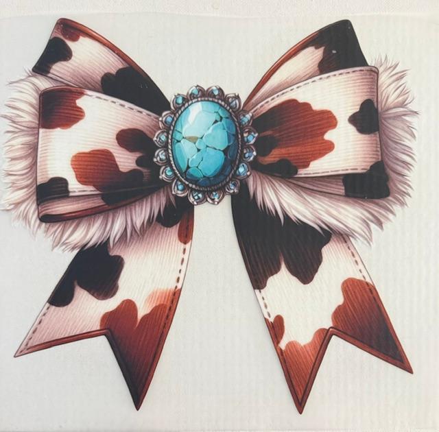 Cowhide Bow, white fringe, teal rock