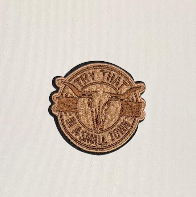 Try that in a Small Town round tan hat patch