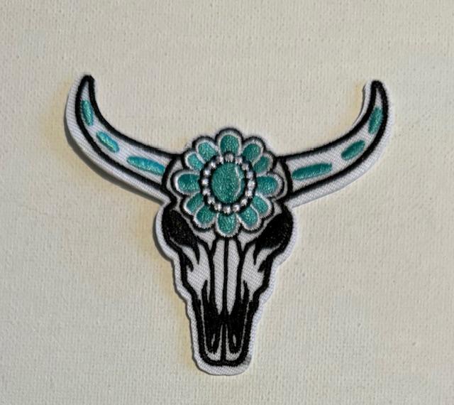 Skull w/ teal rock
