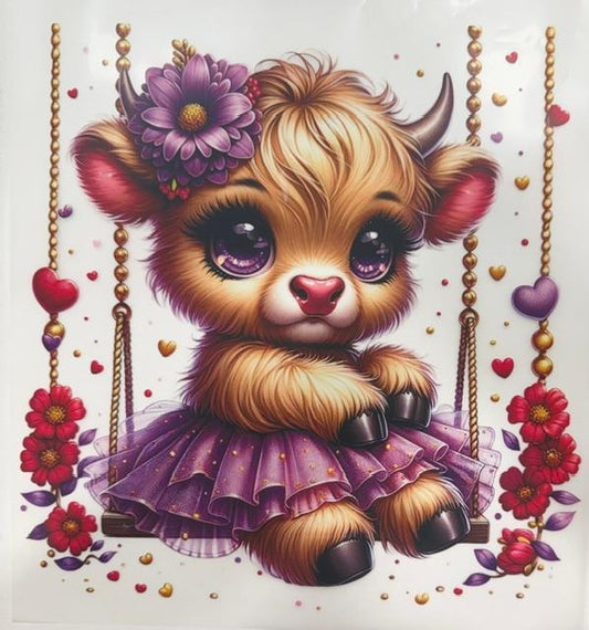 Cow on swing, purple tutu