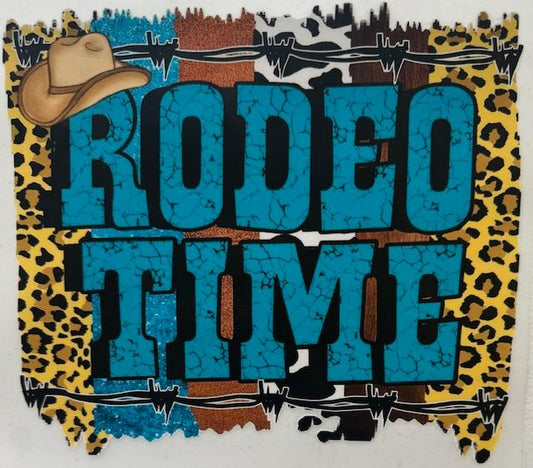 Rodeo Time-blue letters,barb wire on top & bottom