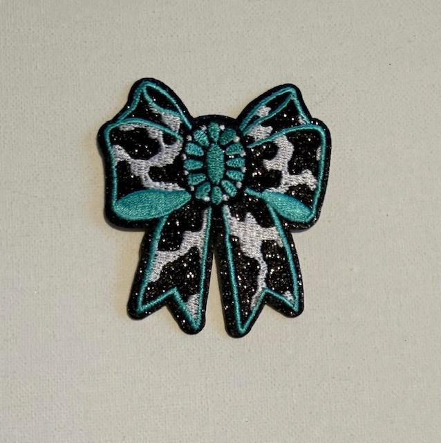 Cow print bow w/ teal hat patch