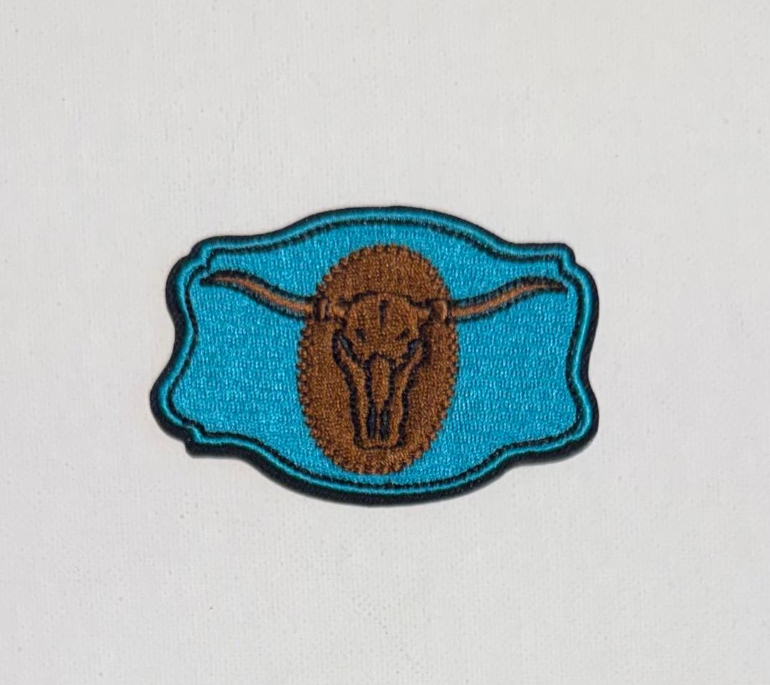 Skull teal hat patch