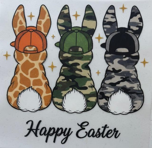 Bunnies w/ caps on. orange, green, gray