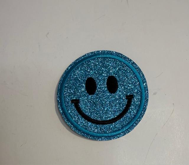 Smiley-teal hat patch