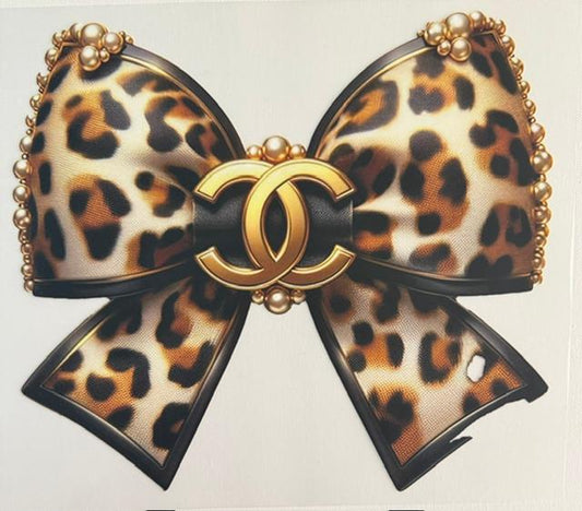 CC Cheetah bow, gold pearls