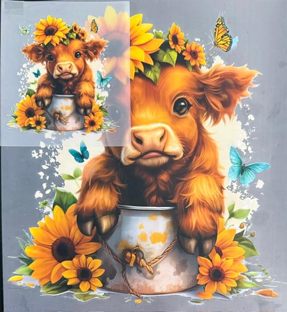Cow in pot, sunflowers