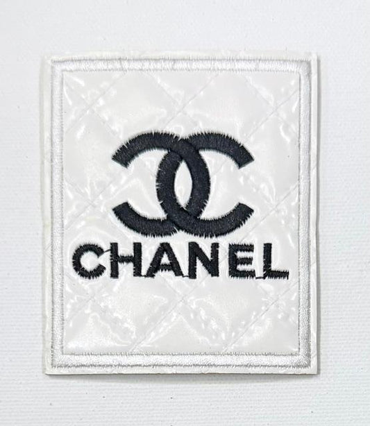 Chanel-white patent leather hat patch