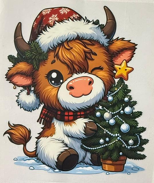 Christmas Cow - holding tree
