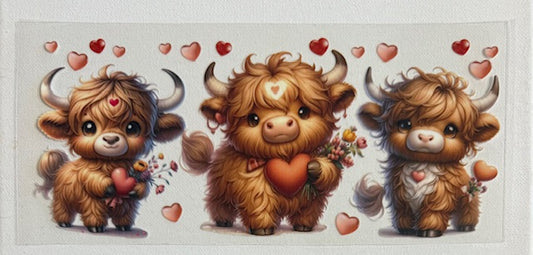 3 cows with hearts