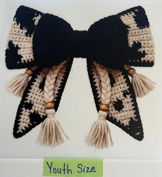 Black/white cow print yarn bow