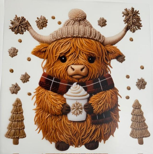 Christmas Cow holding coffee