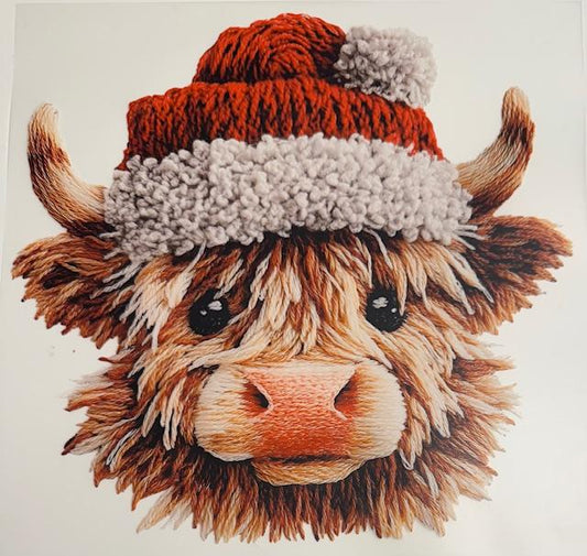Christmas Cow in Santa hat