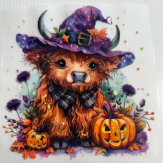 Halloween Cow wearing witch hat
