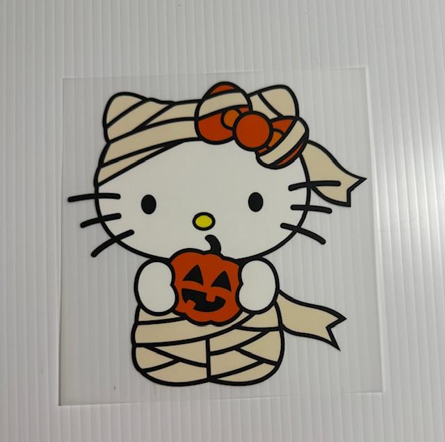 Hello Kitty mummy holding pumpkin - youth size