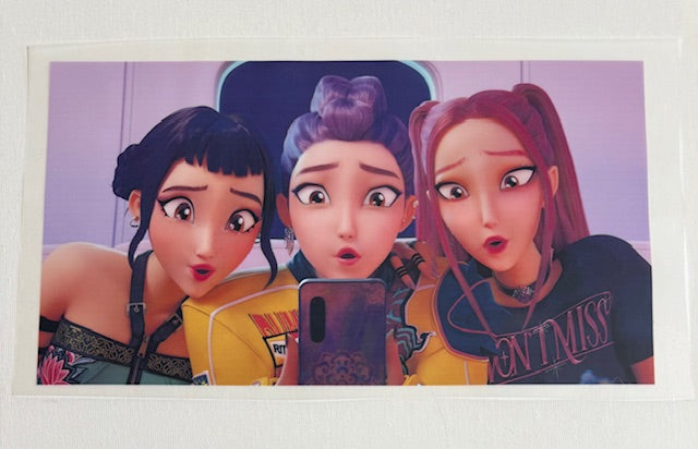 Huntrix girls on phone