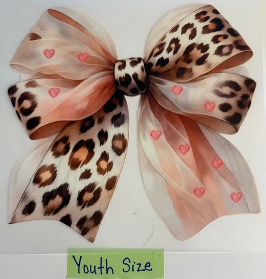 Pastel pink cheetah sheer bow