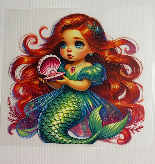 Mermaid holding shell