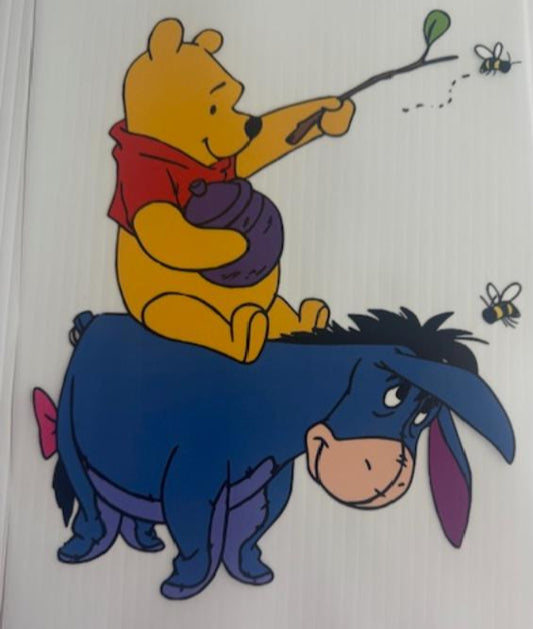 Pooh riding Eeyore